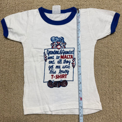 80s Kids Toddler Baby Vintage T-Shirt “Grandma & Grandad went to Malta and all they got me was this lousy T-Shirt” White Short Sleeve T-Shirt 1-2T