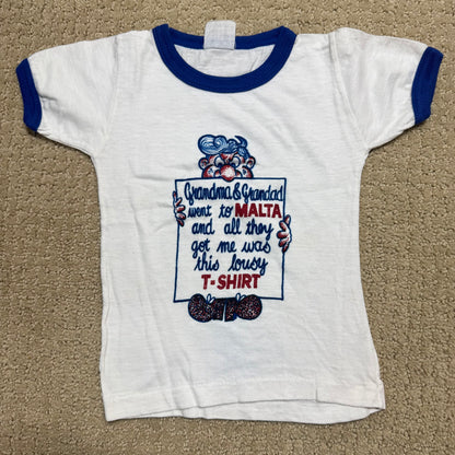 80s Kids Toddler Baby Vintage T-Shirt “Grandma & Grandad went to Malta and all they got me was this lousy T-Shirt” White Short Sleeve T-Shirt 1-2T